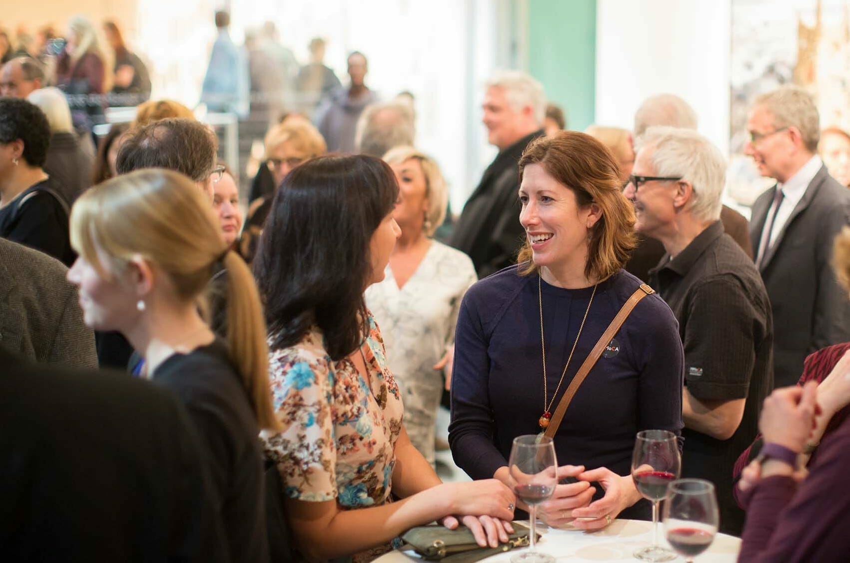 MMoCA Members enjoy an opening reception in the MMoCA Lobby