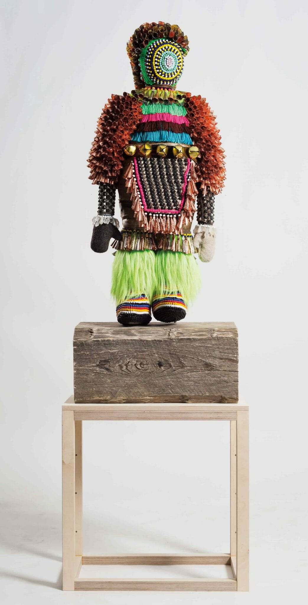 Jeffrey Gibson (Mississippi Band Choctaw/Cherokee), Like A Hammer, 2014. Elk hide, glass beads, artificial sinew, wool blanket, metal studs, steel, found pinewood block, and fur; 56 × 24 × 11 in. Collection of Tracy Richelle High and Roman Johnson, courtesy of Marc Straus Gallery, New York. Image courtesy of Jeffrey Gibson Studio and Roberts Projects, Los Angeles, California. Photograph by Peter Mauney.