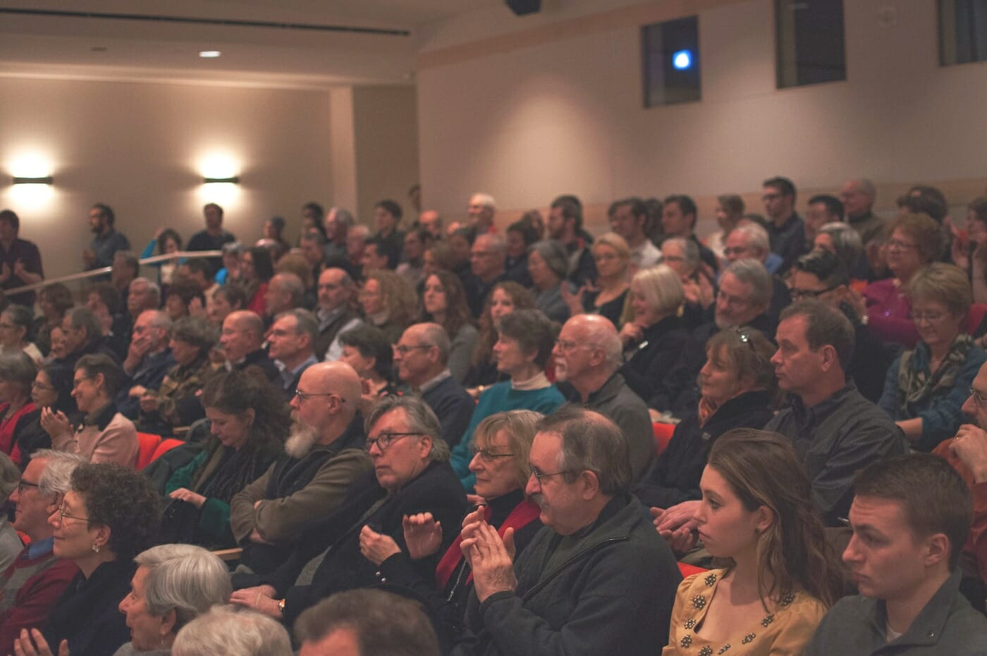 audience seated in a lecture hall