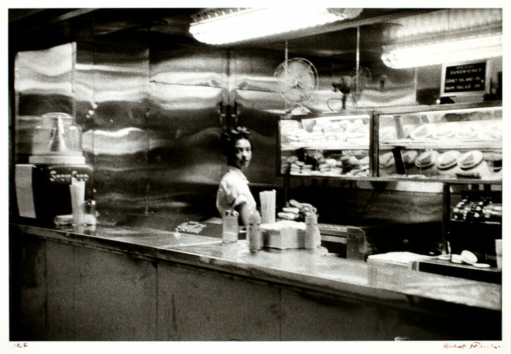 Coffee Shop, Railroad Station – Indianapolis, from The Americans. Artist: Robert Frank. Date: 1956. Medium: gelatin silver print.