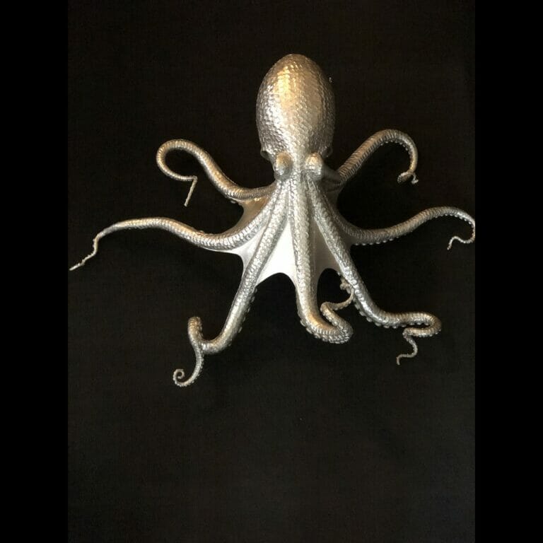 an octopus sculpture made of metal