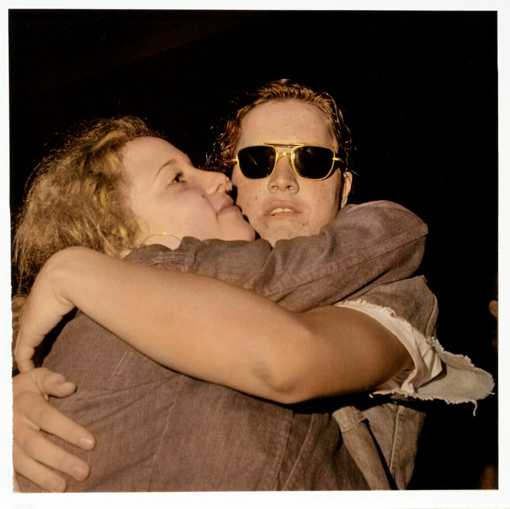 A Rose and a Baby Ruth. Artist: Cate Loughran. Medium: hand-tinted photographs.