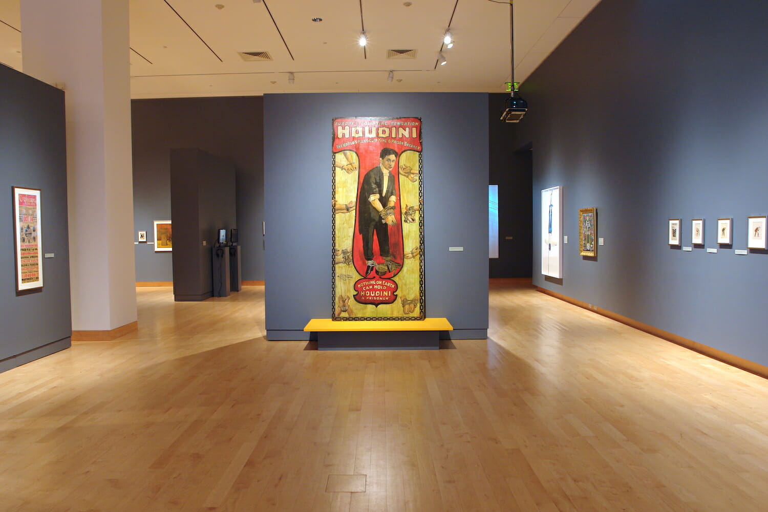 installation view of Houdini: Art and Magic featuring framed artworks around the gallery