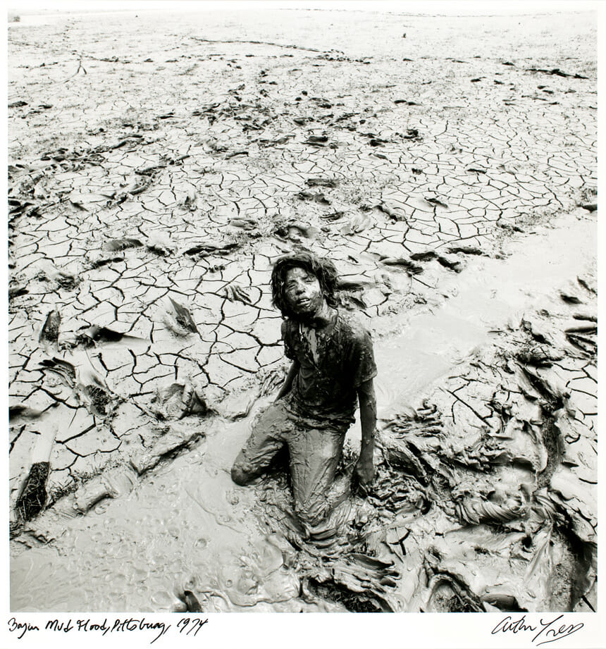 Boy in Mud Flood, Pittsburg. Artist: Arthur Tress. Date: 1974. Medium: gelatin silver print.