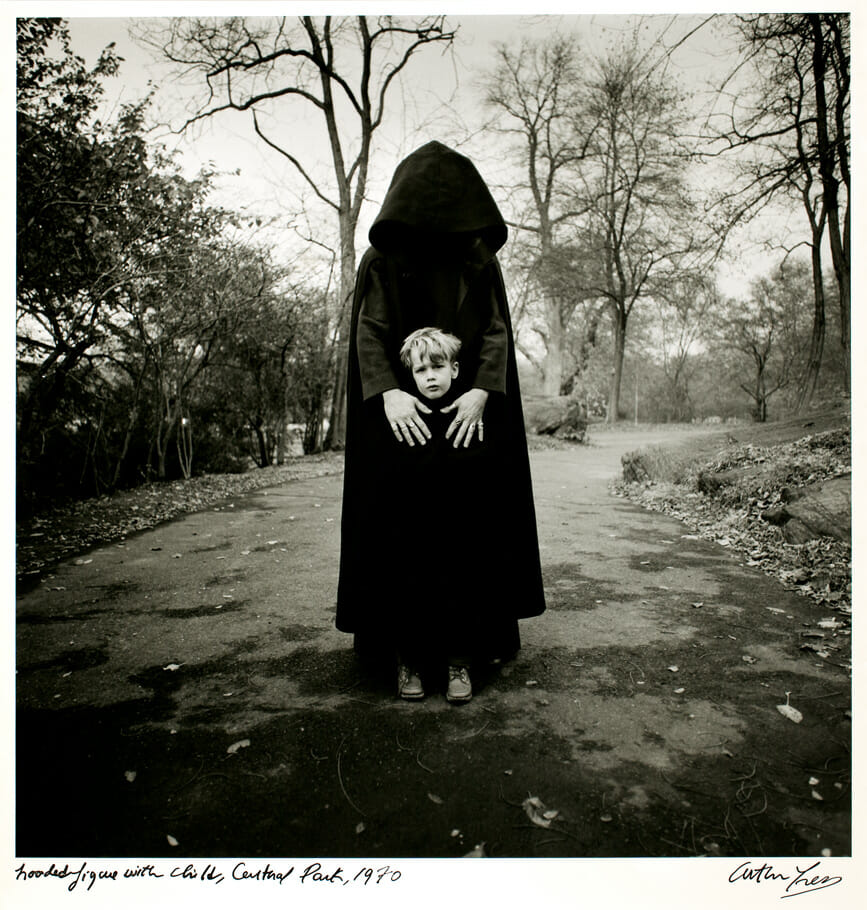 Hooded Figure with Child, Central Park. Artist: Arthur Tress. Date: 1970. Medium: gelatin silver print.