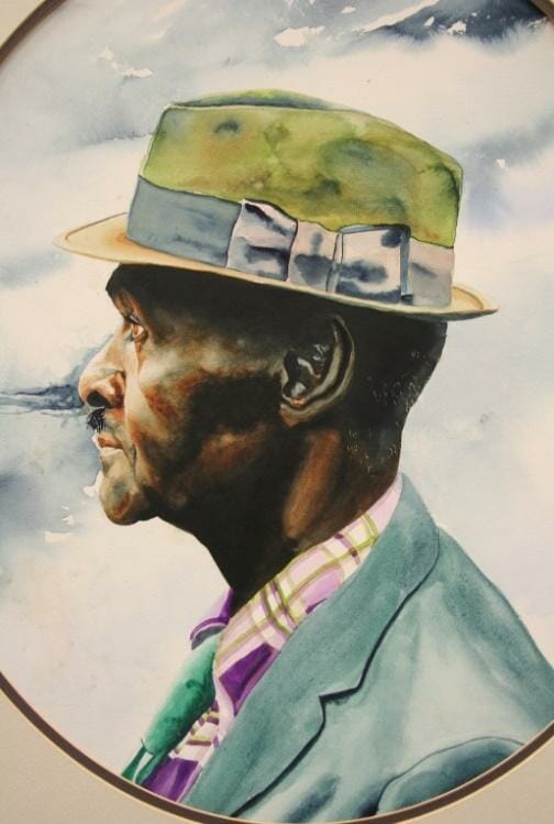 Watercolor portrait of a man's profile, wearing a blazer and a hat